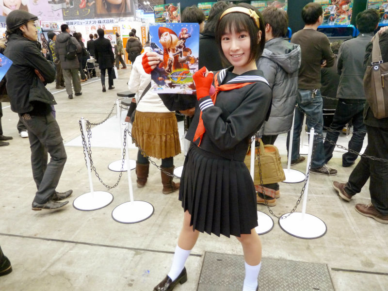 Illustration for article titled 2009's Cosplaying Arcade Game Booth Companions